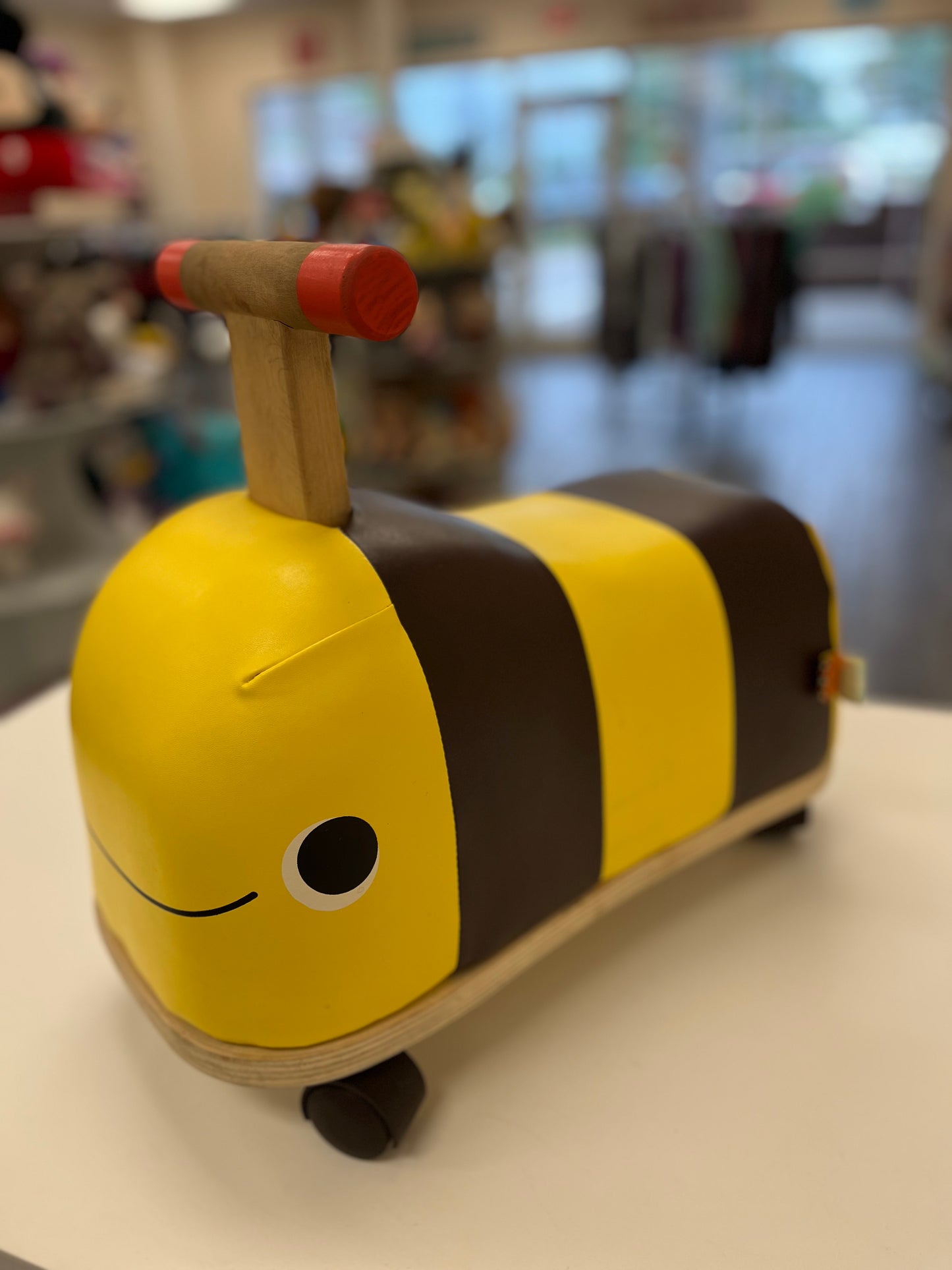 B. Toys Boom Buggy Wooden Bee Ride-On