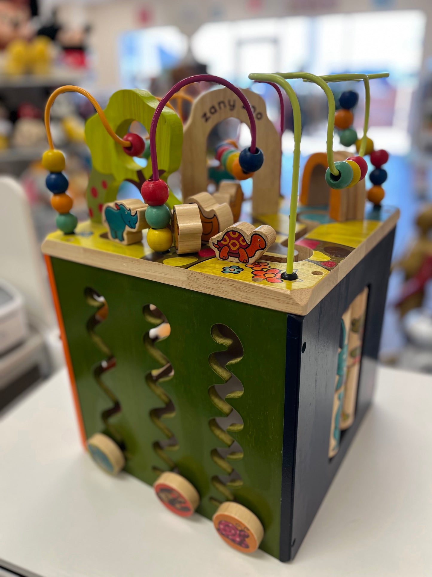 B. toys Zany Zoo Wooden Activity Cube