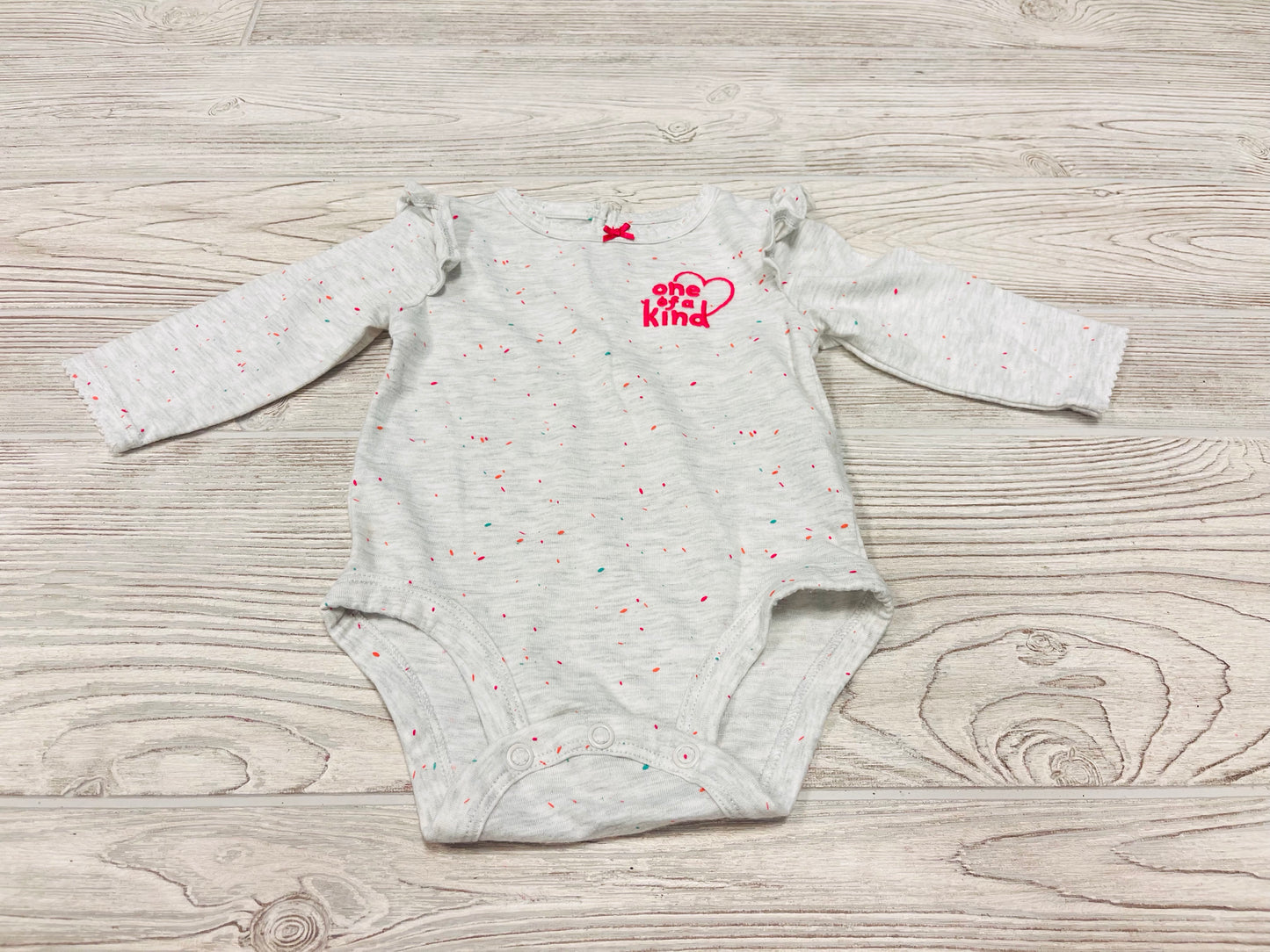 Carter’s “One of a Kind” Long Sleeve Onesie