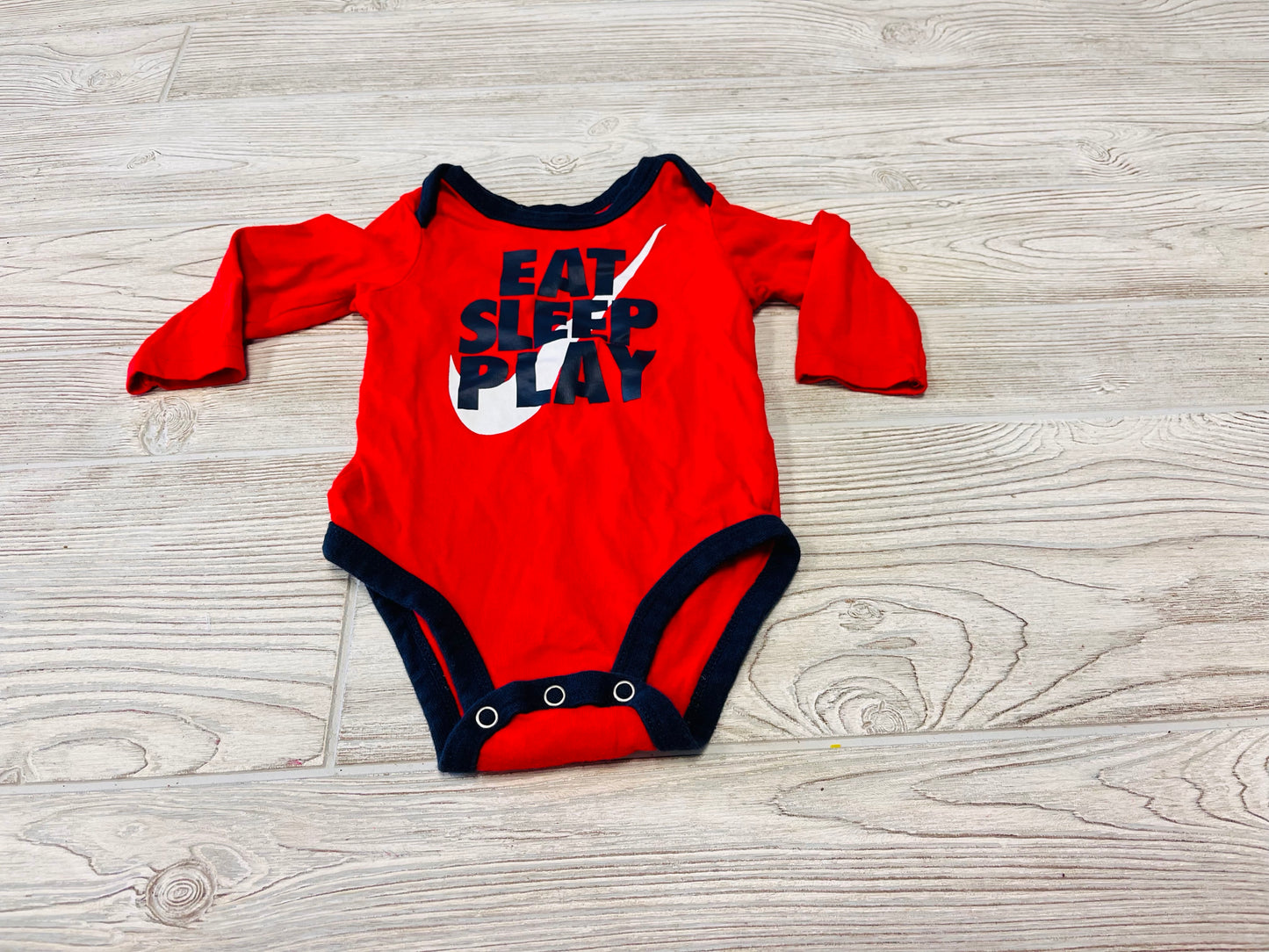 Nike “Eat Sleep Play” Long Sleeve Onesie