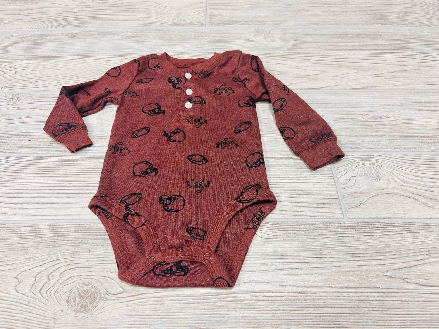 Carter’s Football Print Long Sleeve Onesie