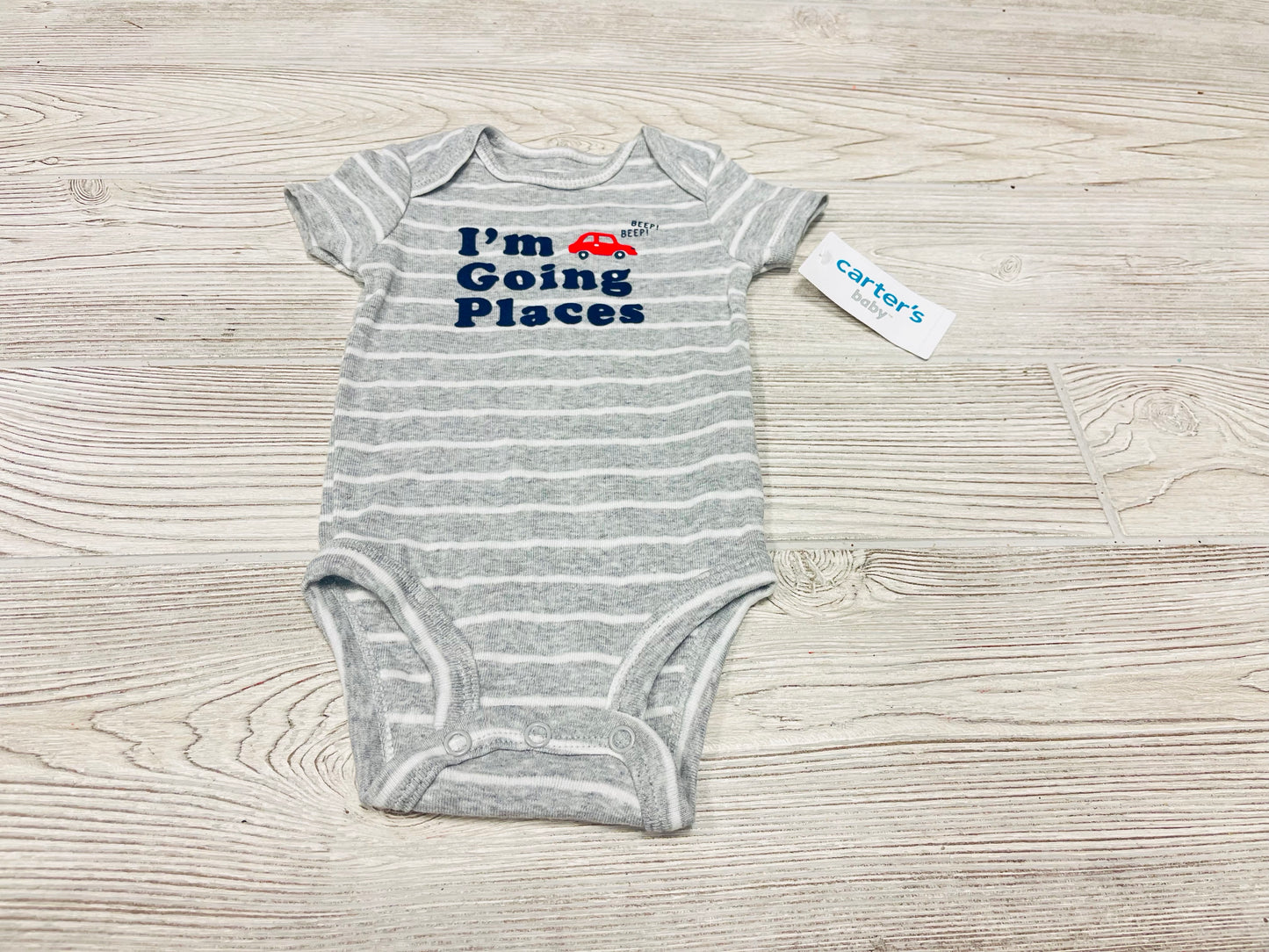 Carter’s “I’m Going Places” Short Sleeve Onesie
