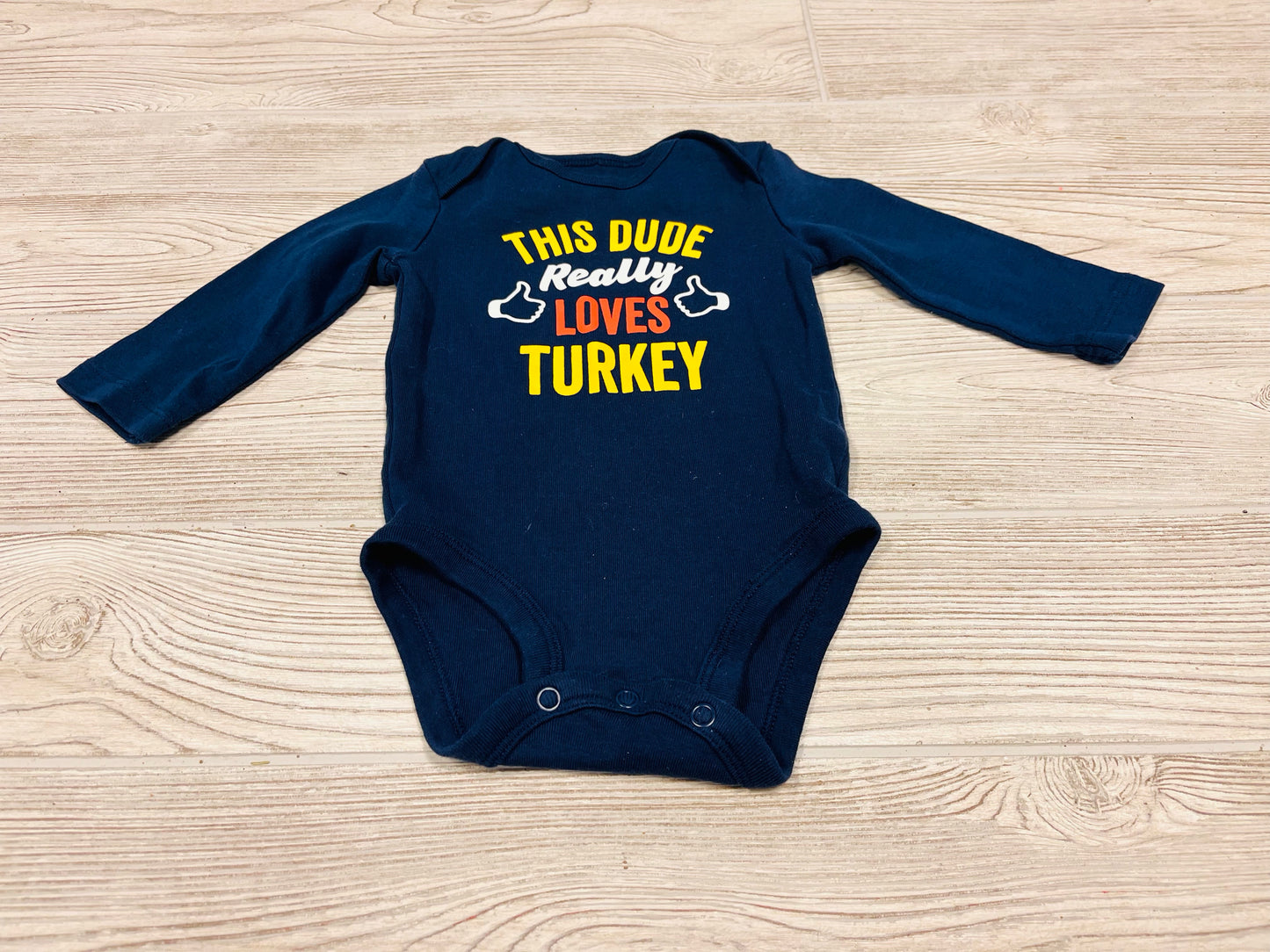 Carter’s “This Dude Really Loves Turkey” Long Sleeve Onesie