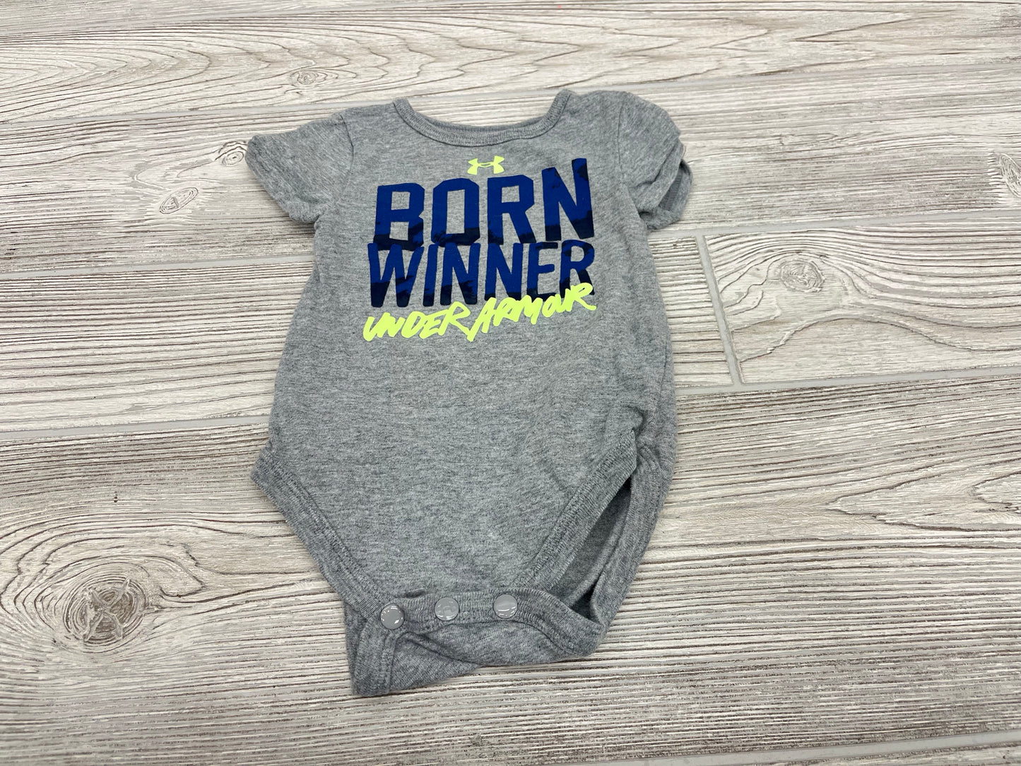 Under Armour “Born Winner” Short Sleeve Onesie