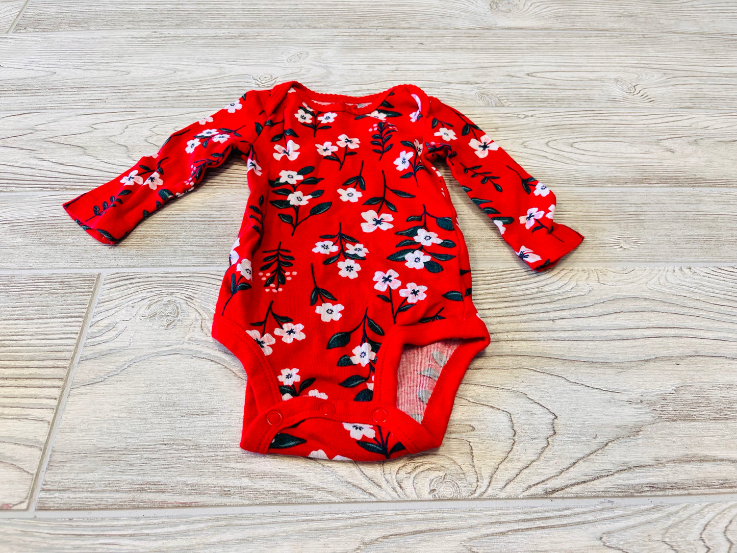 Carter’s Flower Print Long Sleeve Onesie
