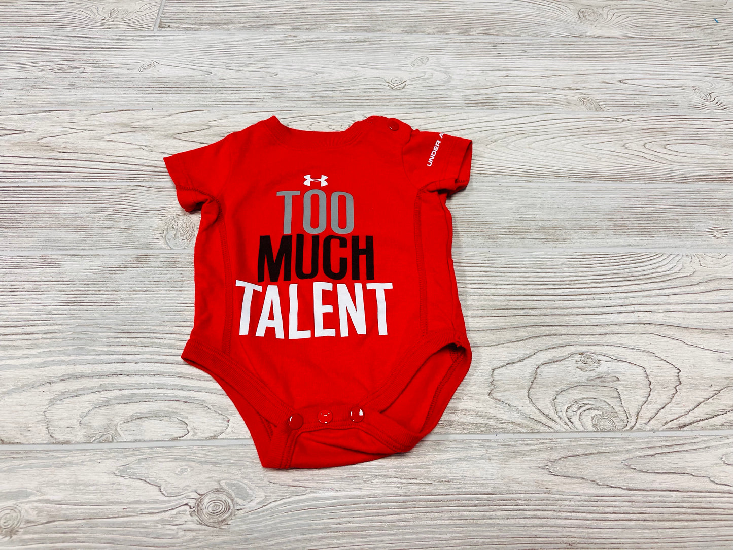 Under Armour “Too Much Talent” Short Sleeve Onesie