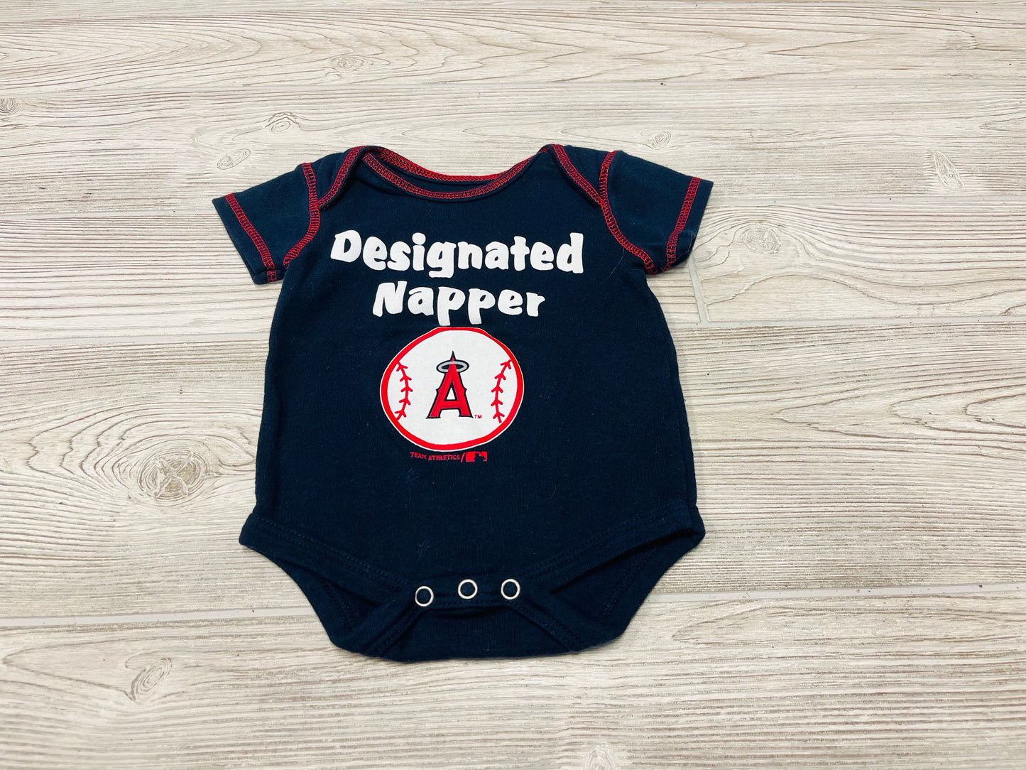 Genuine Merchandise “Designated Napper” Angels Short Sleeve Onesie