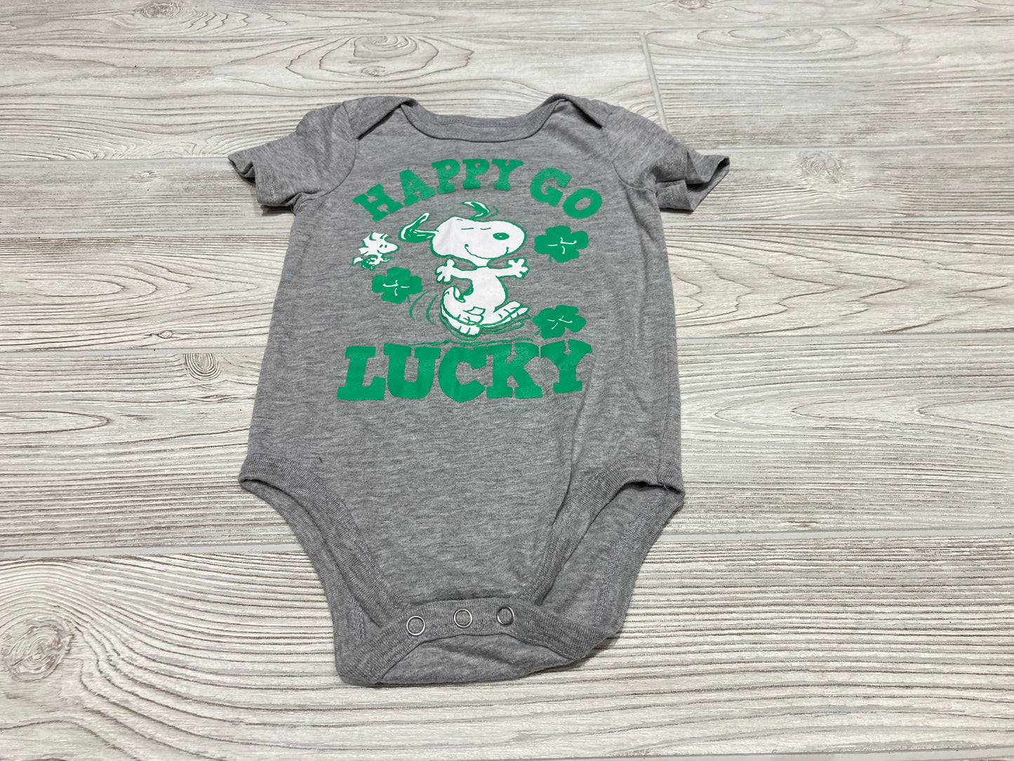 Peanuts “Happy Go Lucky” Short Sleeve Onesie