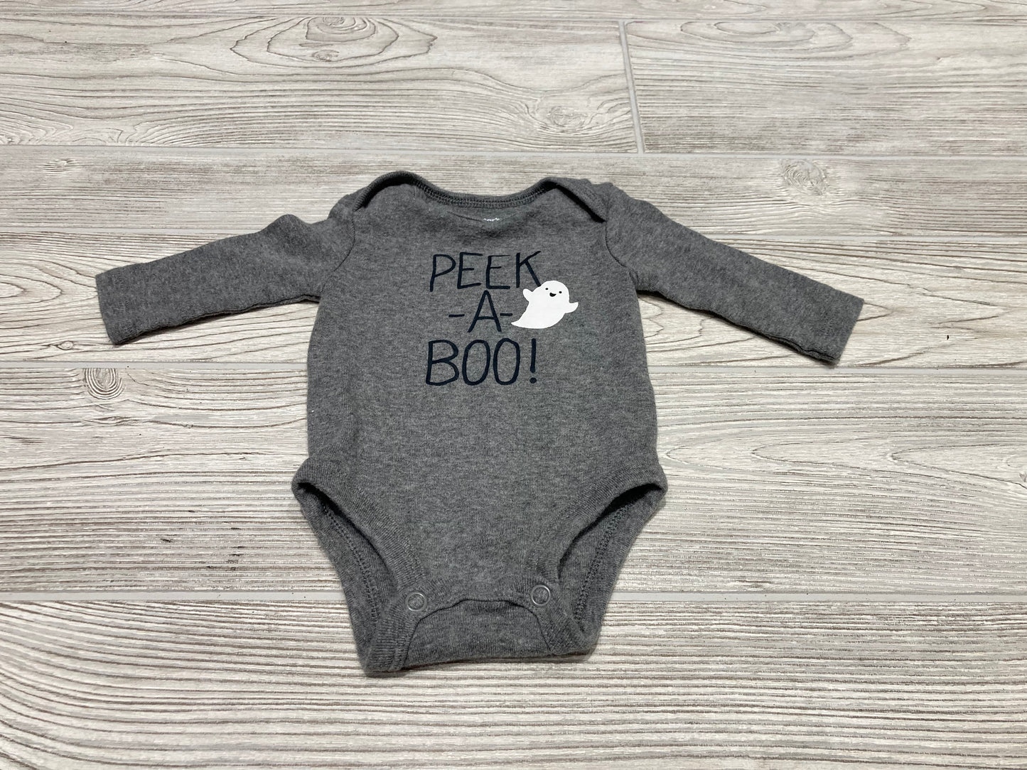Carter’s “Peek-A-Boo” Long Sleeve Onesie